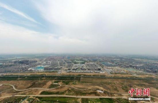 图为6月21日，航拍雄安新区容东片区。(无人机照片) 中新社记者 韩冰 摄